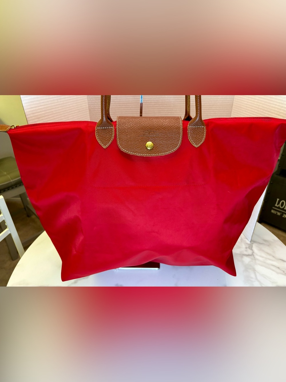 Longchamp Le Pliage XL travel bag.